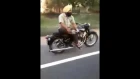 Multi-Tasking at its best!! Dude from India reads the newspaper while riding a bike. MUST WATCH!!