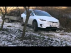 Tesla Model X offroad with trailer