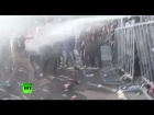 Hungarian police tear gas, water cannon blocked refugees at fortified border