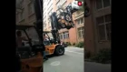 Double forklift load into second floor window fails miserably!