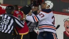Lucic tries to fight Mike Smith after hacking Giordano